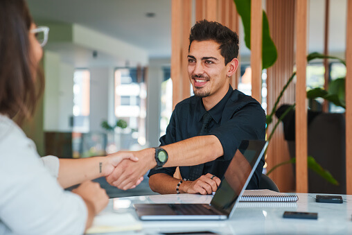 Two people shaking hands